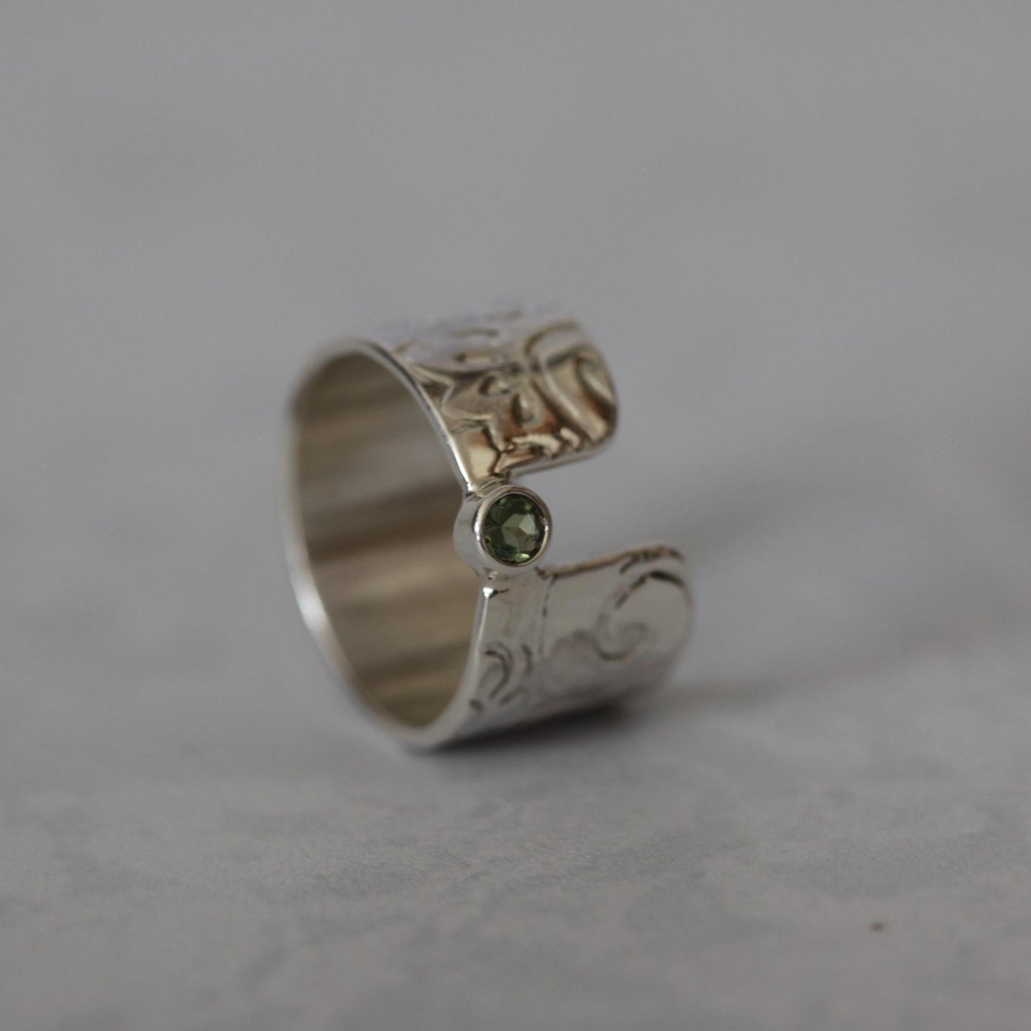 Sweet Mint Green Tourmaline set in a Unique Asymmetrical Ring of Roll Printed Recycled Sterling Silver size 6.5