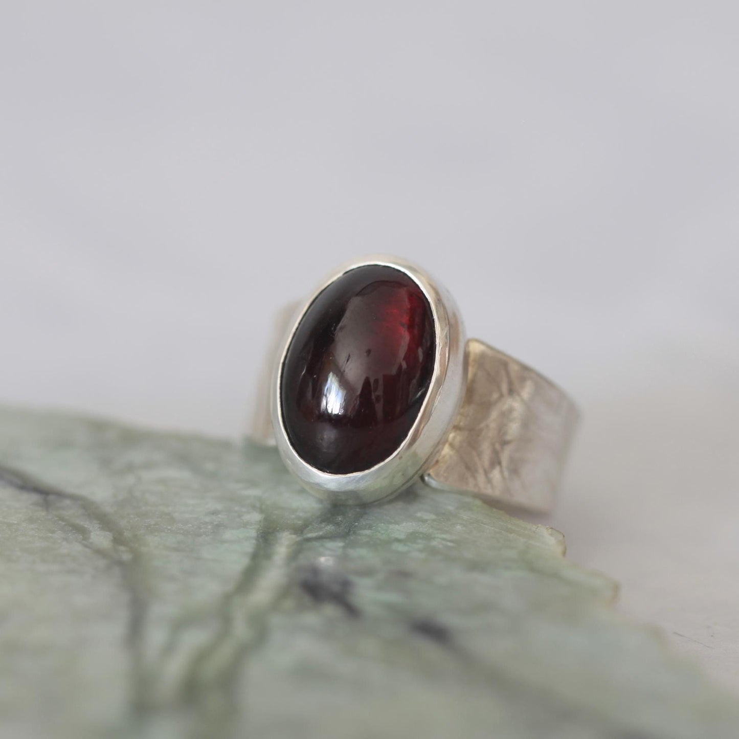 Moody Oval Red Garnet on Tapered Sterling Silver Band size 7.5