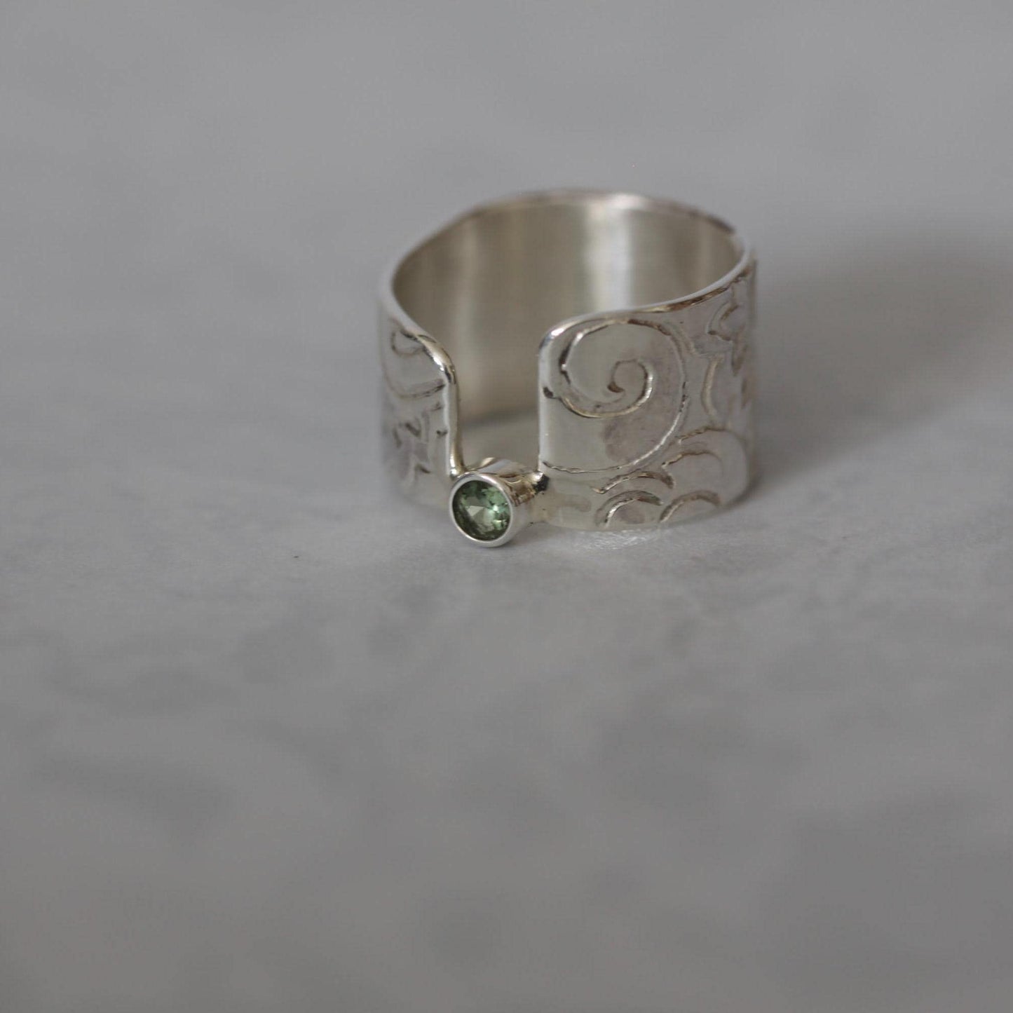 Sweet Mint Green Tourmaline set in a Unique Asymmetrical Ring of Roll Printed Recycled Sterling Silver size 6.5