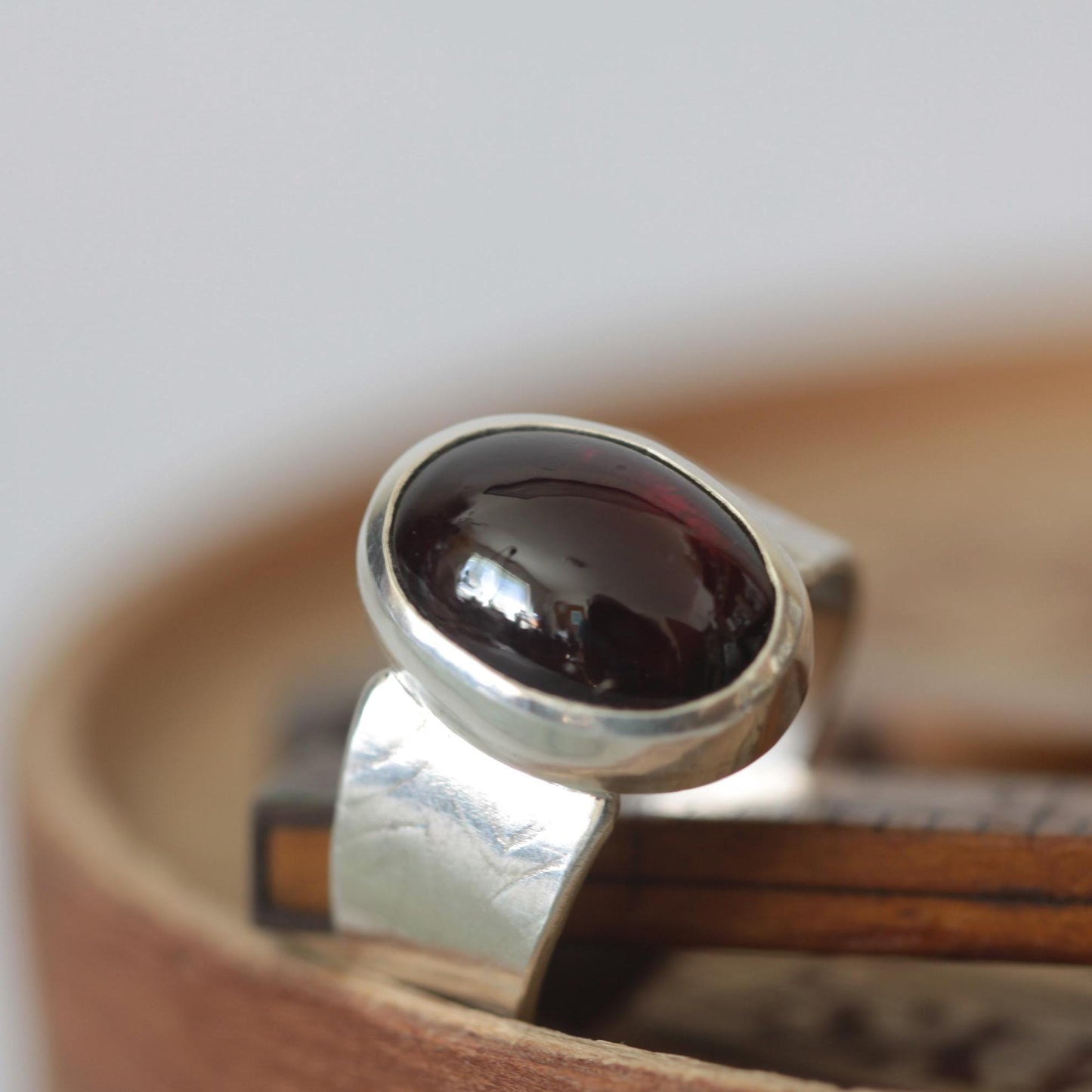 Moody Oval Red Garnet on Tapered Sterling Silver Band size 7.5