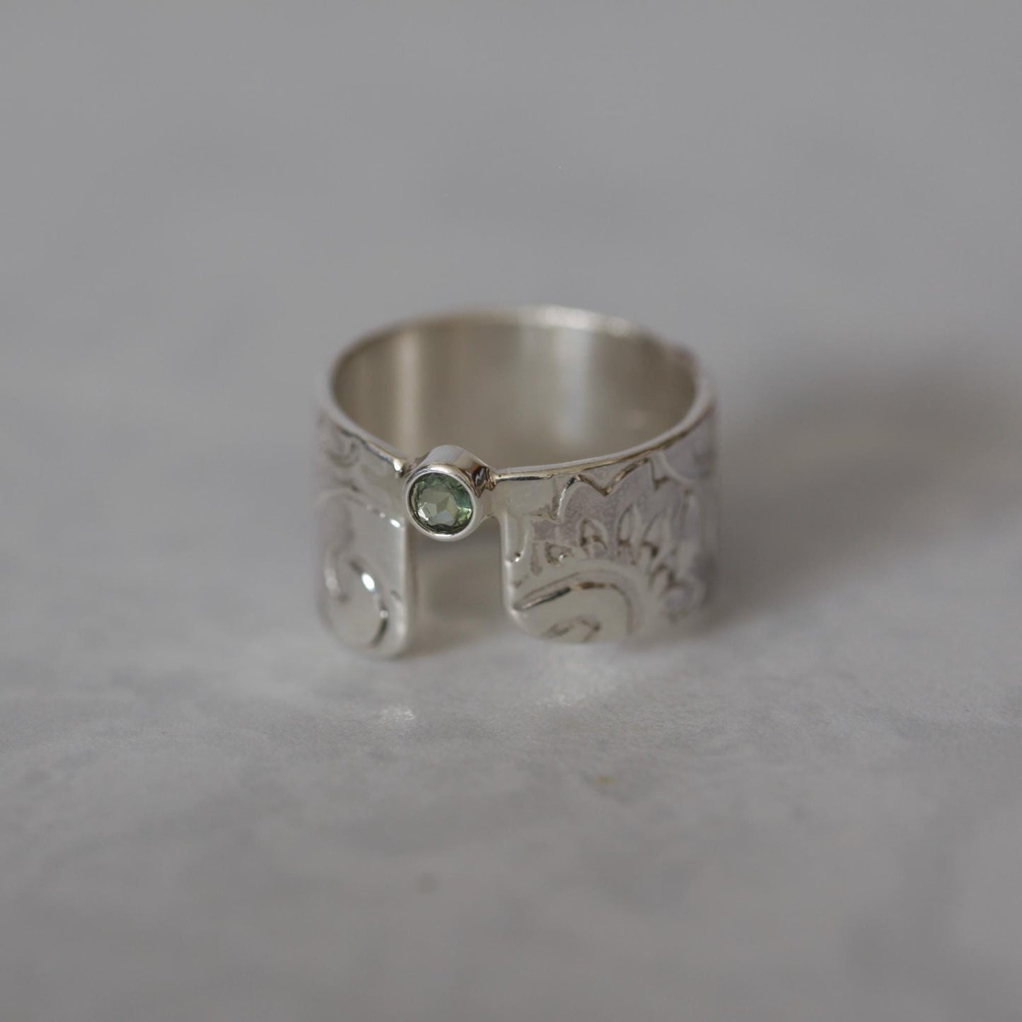 Sweet Mint Green Tourmaline set in a Unique Asymmetrical Ring of Roll Printed Recycled Sterling Silver size 6.5